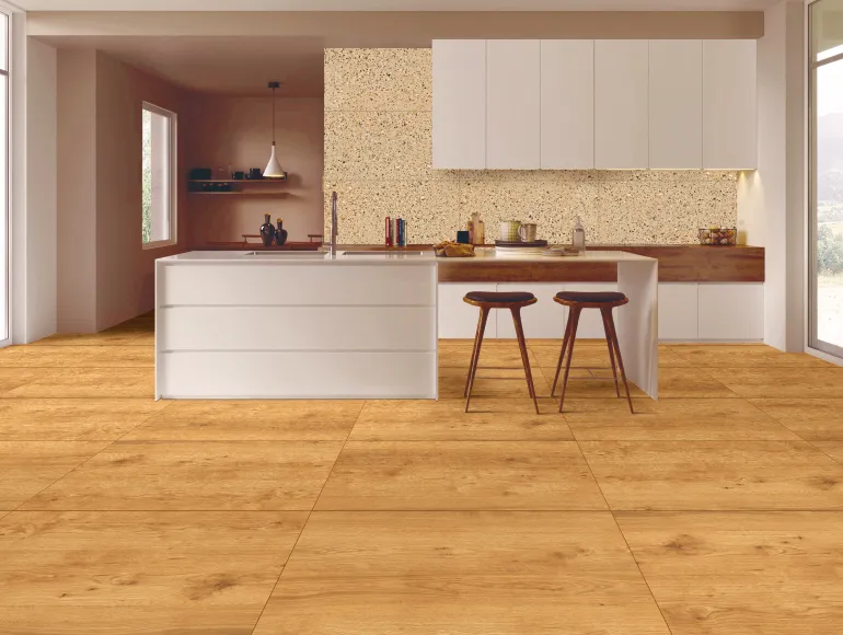 Elegant beige kitchen design featuring an island layout and wooden floor tiles